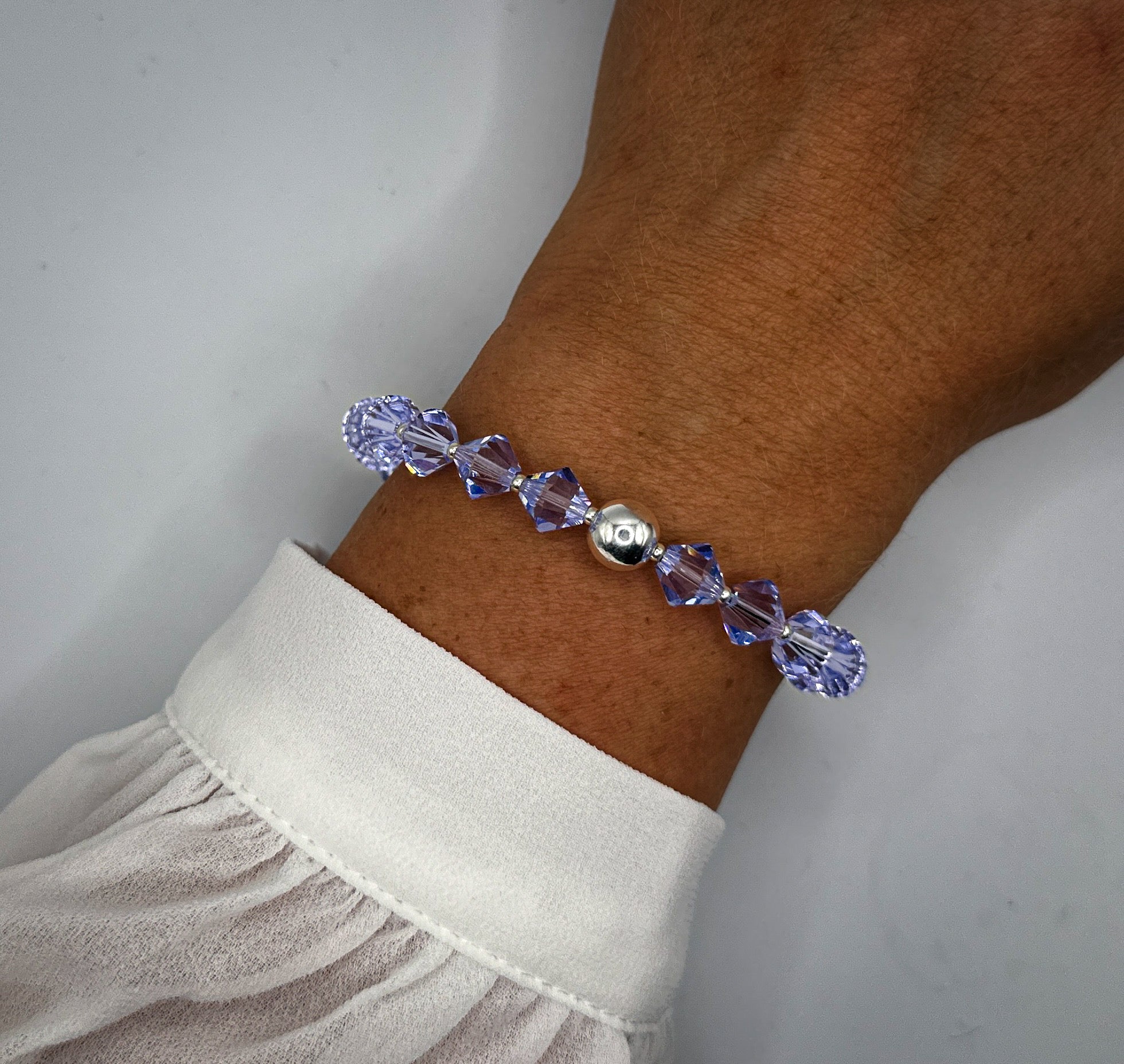 Armband aus lila Swarovski-Kristallperlen und 925-er Sterlingsilberkugel