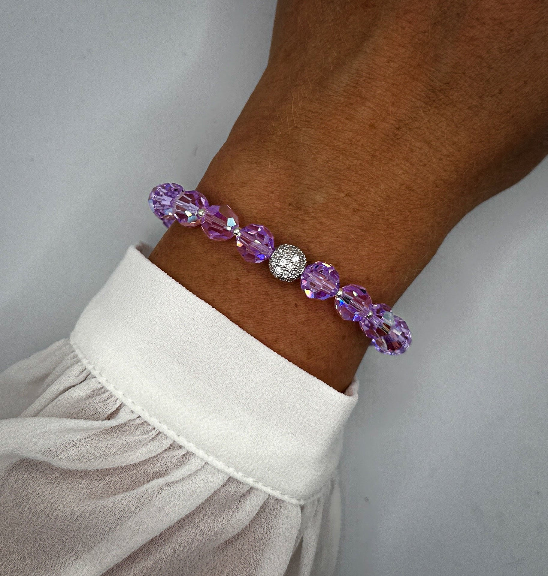 Armband aus lila Swarovski-Kristallen und Strassperle