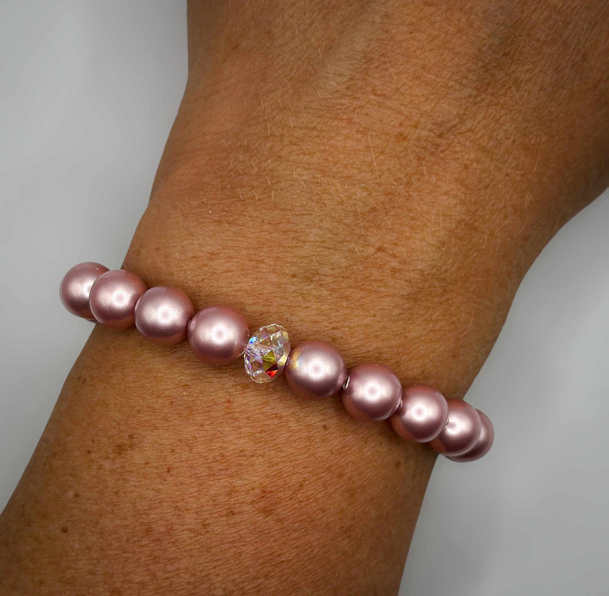 Armband aus pinken Swarovski-Perlen und Swarovski-Kristall