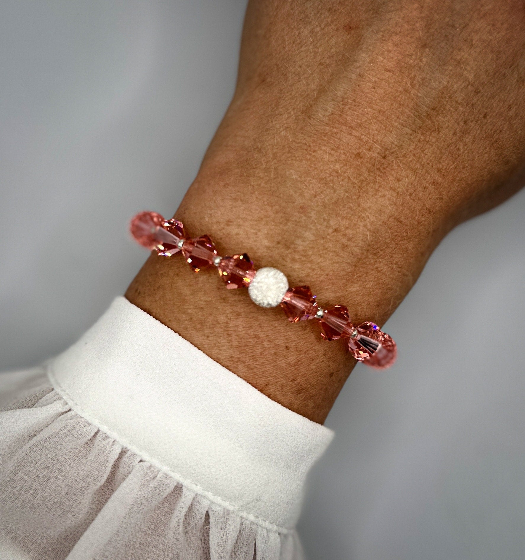 Armband aus rosa Swarovski-Kristallen und diamantierter 925er Sterling-Silberperle