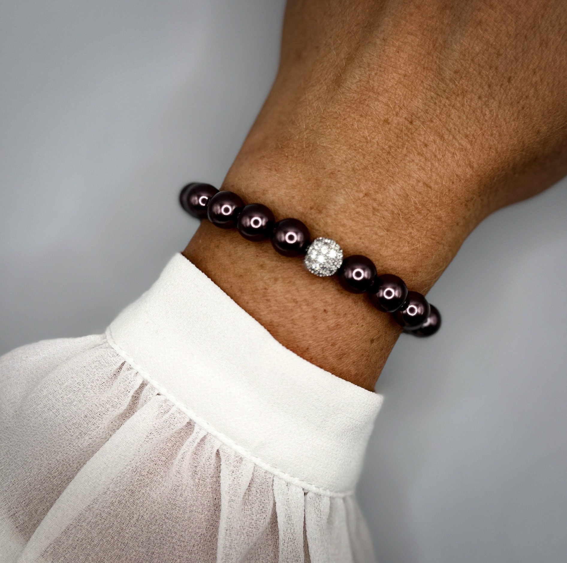 Armband aus schimmernden Swarovski-Perlen und Silberperle