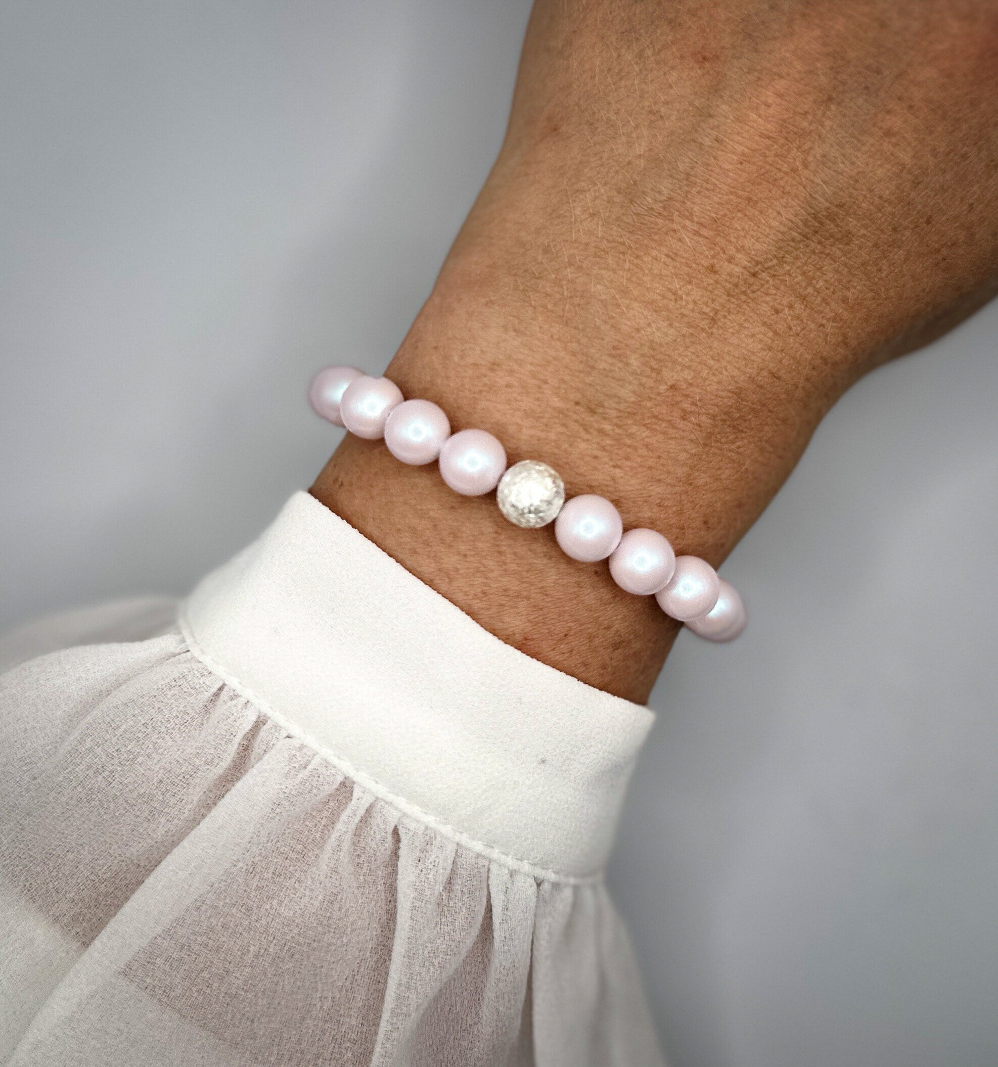 Armband aus rosa schimmernden Swarovski-Perlen und 925-er Sterling Silberperle